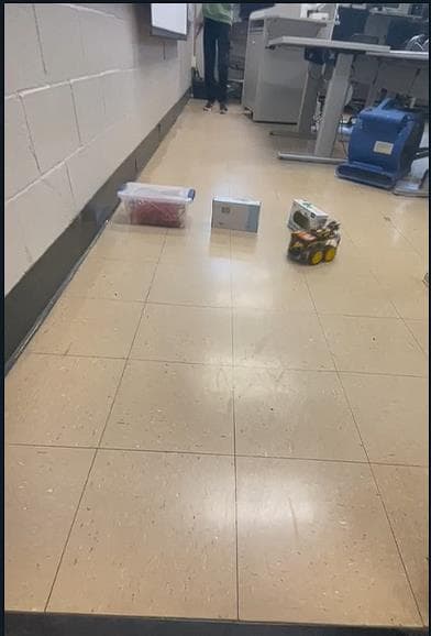 Robot navigating between obstacles during a hardware test run