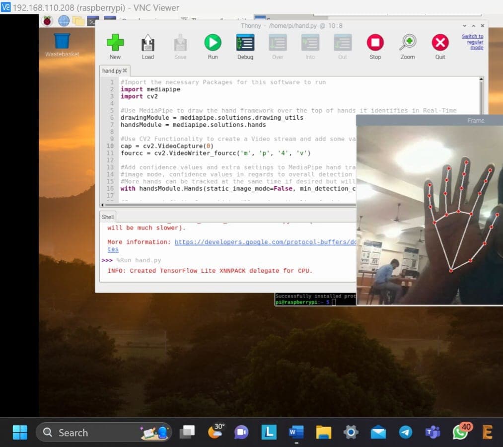 Raspberry Pi desktop over VNC running the MediaPipe hand tracking script with the camera feed
